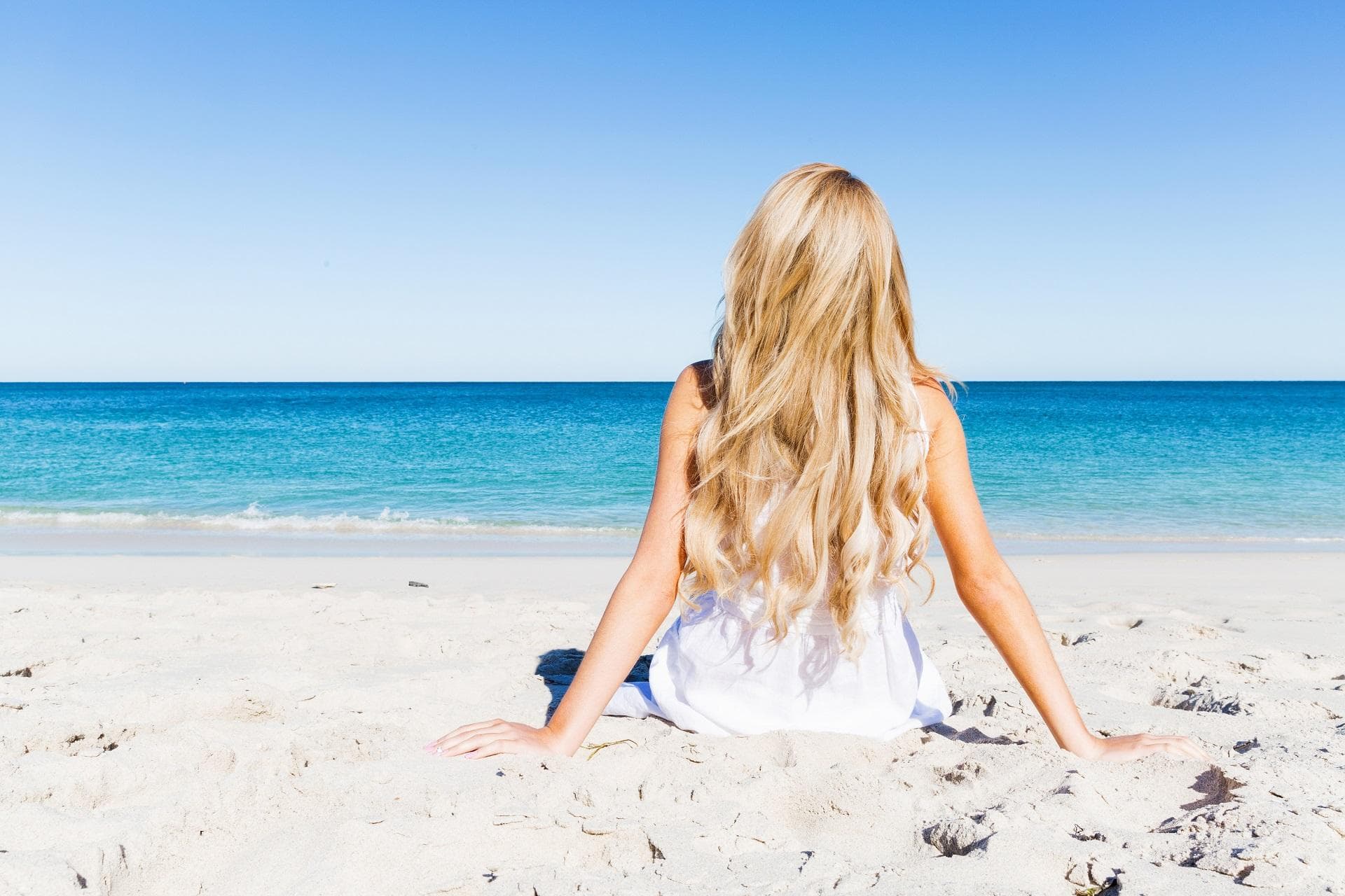 Ways to protect your hair from the summer sun, without a hat